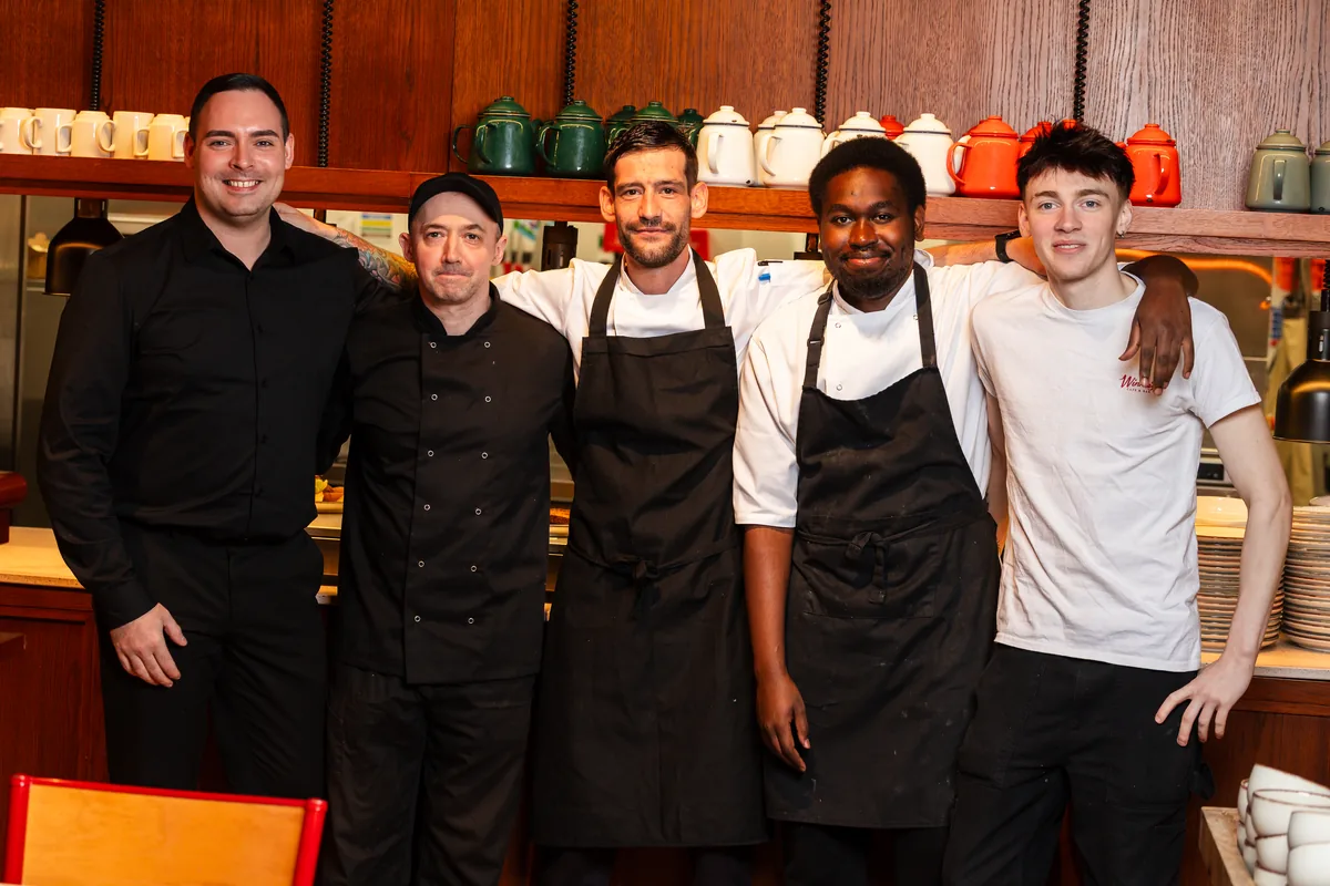 Winnie's chefs standing together in the kitchen